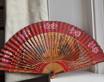 Painted Spanish fan: Lovely vibrant hand painted fabric fan with red painted wood frame and matador and flamenco motifs, ladies hand fan