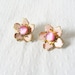 Pink flower earrings: Pretty pink cabochon and gold tone filigree brass flower clip on earrings