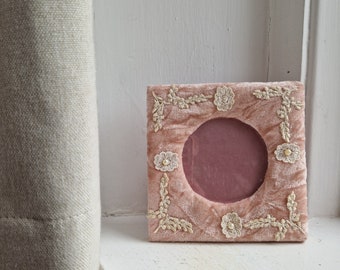 Velvet photo frame: beautiful pink padded velvet square photo frame with round aperture and lace and faux pearl detailing, velvet frame