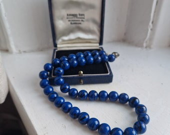 Royal blue necklace: Lovely royal blue & black flecked lucite plastic short beaded necklace with silver tone fixings, blue beaded necklace