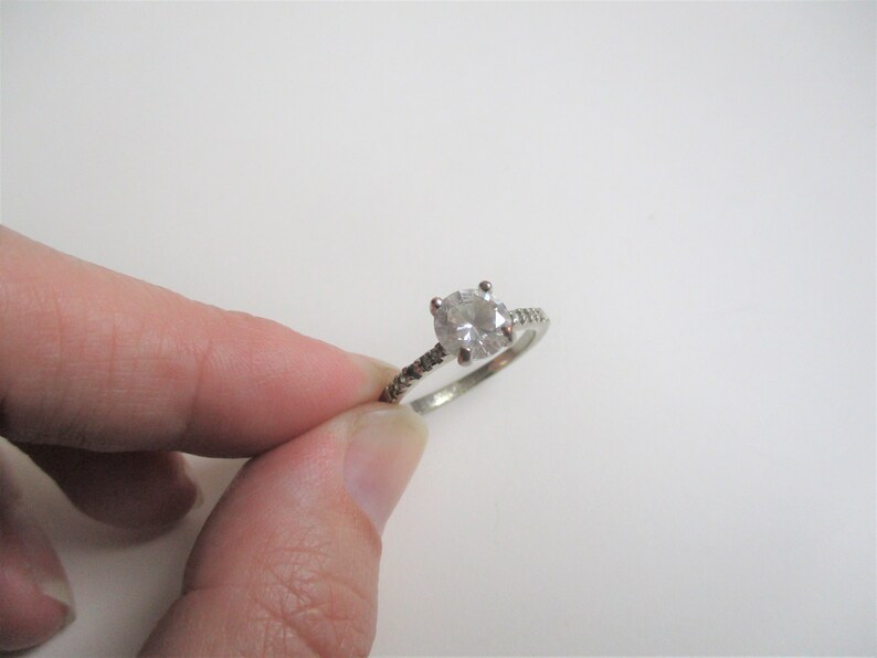 size 10 cocktail ring silver plated sparkly ring Rhinestone engagement ring: Dazzling rhinetone and silver plated engagement style ring