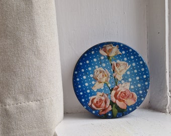 Vintage biscuit tin: vintage screen printed blue & pink patterned toffee tin with rose motif, small round blue vintage toffee or sweet tin