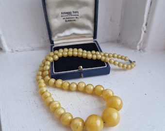 Yellow glass beads: Amazing weighty vintage yellow solid moulded glass beaded necklace, chunky yellow string of beads pendant necklace