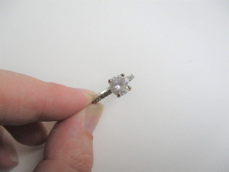 size 10 cocktail ring silver plated sparkly ring Rhinestone engagement ring: Dazzling rhinetone and silver plated engagement style ring