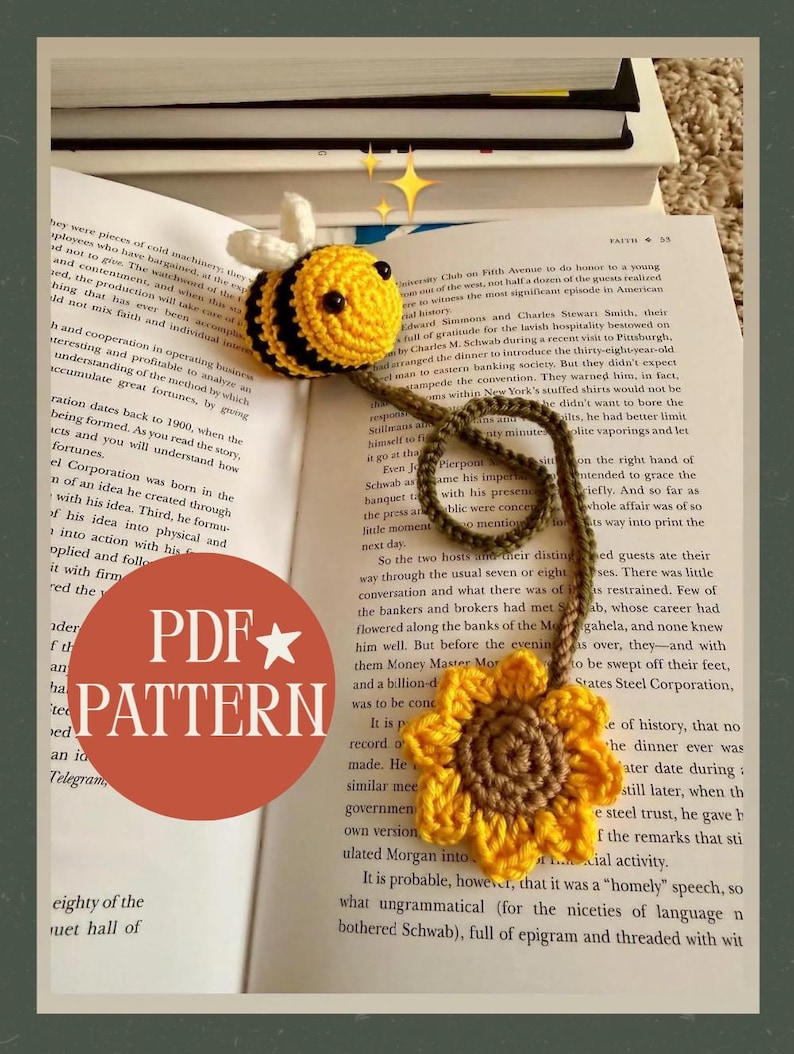 May include: A handmade crochet bookmark featuring a yellow and black bee and a yellow sunflower. The bee is attached to the top, and the sunflower hangs below. The bookmark is on a book with the text "PDF PATTERN".