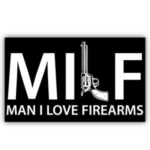 May include: Black rectangular sticker with white text and a revolver graphic. The text reads "MI F" with the words "MAN I LOVE FIREARMS" below. The revolver is depicted in white.