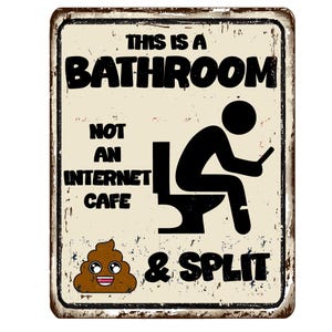 May include: A rectangular metal sign with a distressed finish. The sign reads "THIS IS A BATHROOM NOT AN INTERNET CAFE & SPLIT" in black text. A stick figure is seated on a toilet, looking at a phone. A cartoon poop emoji is also present.