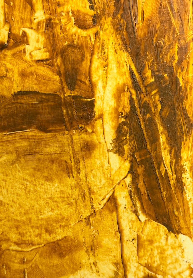 May include: Abstract artwork with a textured surface, featuring a palette of golden yellow and deep brown hues. The brushstrokes create a dynamic, layered effect, with visible ridges and valleys. The artwork evokes a sense of warmth and depth.