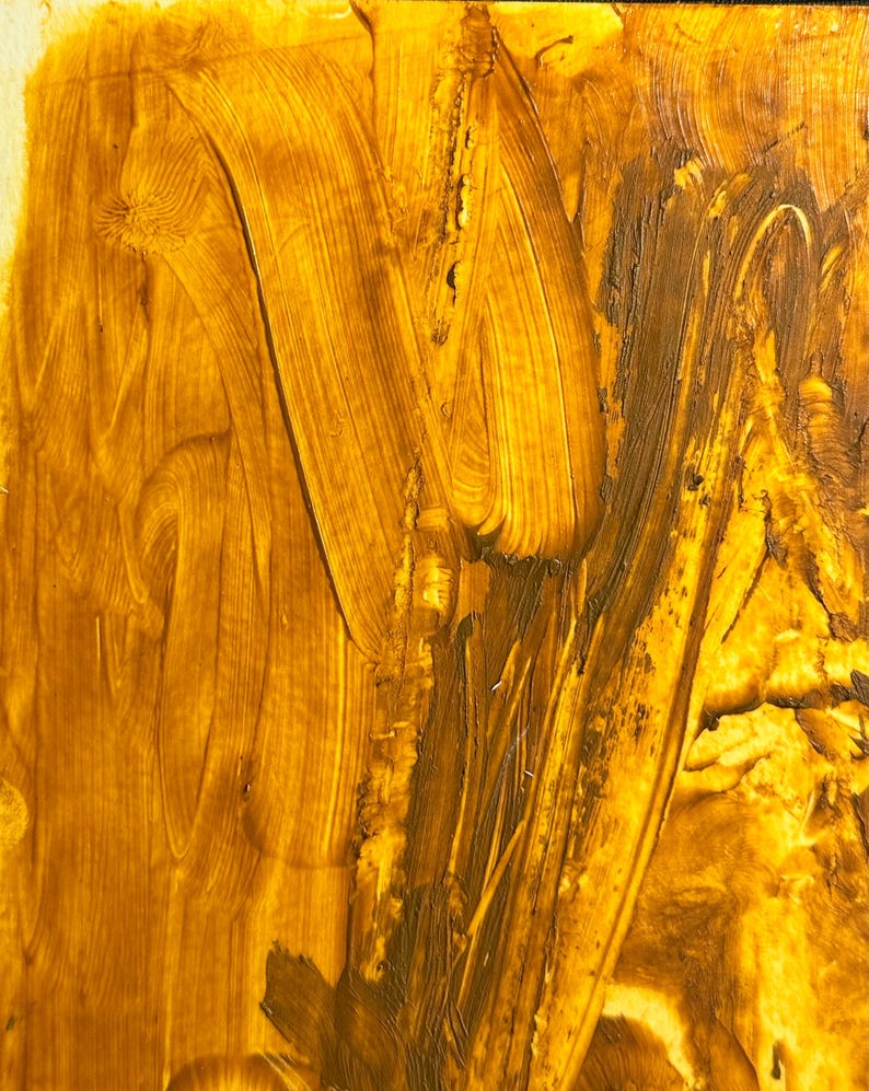 May include: Abstract artwork with a textured surface. The image features a blend of golden yellow and brown hues, applied with visible brushstrokes. The strokes create a dynamic, swirling pattern across the canvas, suggesting movement and depth.