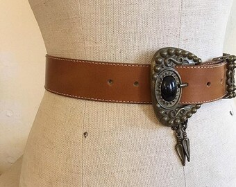Vintage boho brown leather belt with ornate brass buckle