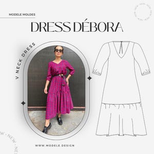 Può includere: Un abito magenta con scollo a V, cintura nera e gonna a balze. L'abito ha un design a fantasia e maniche lunghe. L'immagine include anche un disegno a tratto dell'abito e il testo "DRESS DÉBORA" e "V NECK DRESS".