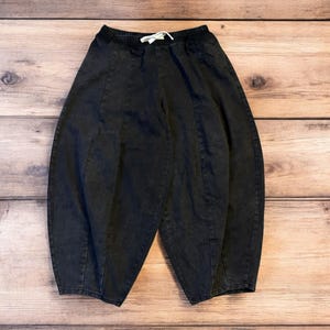 Incredible super baggy wide leg balloon fit jeans in washed black. All sizes.