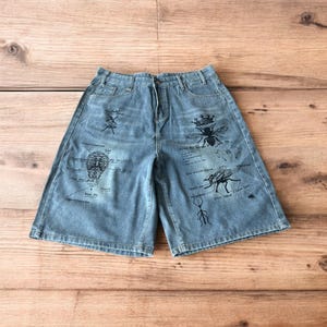 Incredible baggy wide leg denim shorts jorts with graffiti/graphic in light blue. All Sizes.