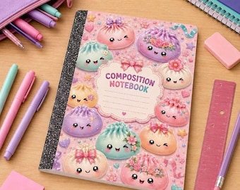 May include: A composition notebook with a pink cover featuring a pattern of smiling, pastel-colored dumplings decorated with bows and flowers. The center has a scalloped label with the text COMPOSITION NOTEBOOK and lines for writing.