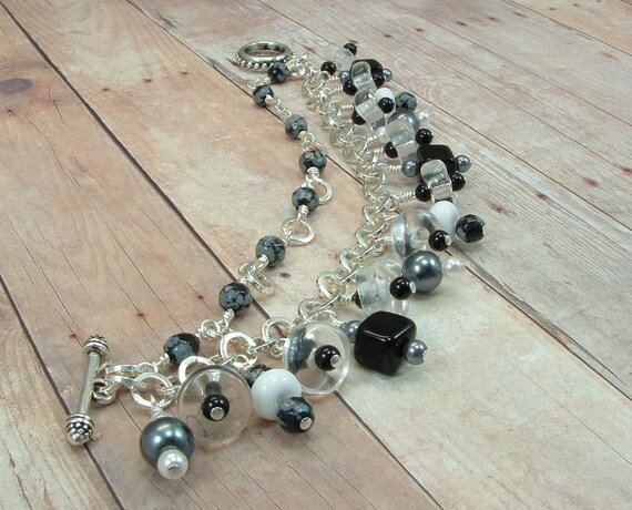 Items similar to Beaded Charm Bracelet Black and White Circles and ...