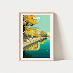 May include: A framed art print featuring a scenic view of Gomel, Belarus. The artwork depicts a yellow building with a teal sky and a river reflecting the architecture. The print includes the text "GOMEL BELARUS".
