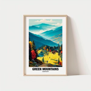 May include: A framed print featuring a vibrant landscape of the Green Mountains in Vermont. The artwork showcases layered blue mountains, a yellow meadow, and colorful autumn trees. The text "GREEN MOUNTAINS VERMONT" is displayed at the bottom.
