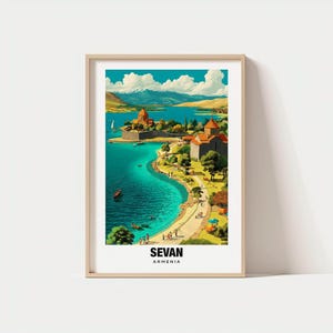 May include: A framed print of Lake Sevan in Armenia. The artwork depicts a vibrant landscape with a turquoise lake, a shoreline with people, and buildings with red-tiled roofs. The text "SEVAN ARMENIA" is at the bottom.