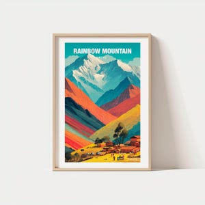 May include: A framed art print featuring a colorful landscape of Rainbow Mountain in Peru. The artwork displays vibrant hues of red, orange, yellow, and blue, with the text "RAINBOW MOUNTAIN PERU" at the top. The print showcases a mountain range and a village.