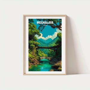 May include: A framed art print featuring a vibrant landscape of Meghalaya, India. The artwork depicts a lush green forest, a turquoise river, and a unique bridge. The text "MEGHALAYA INDIA" is displayed at the top. The print is encased in a light-colored wooden frame.