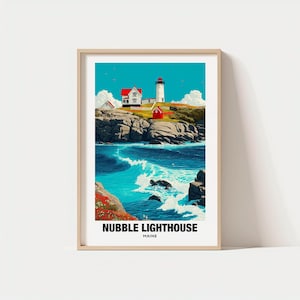 May include: Framed art print featuring a coastal scene with a lighthouse. The artwork depicts a white lighthouse with a red top, a red building, and a white building on a rocky cliff. The ocean waves crash against the rocks, and the sky is a bright blue. The text "Nubble Lighthouse Maine" is at the bottom.