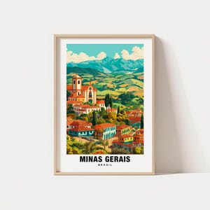 May include: A framed print of Minas Gerais, Brazil. The artwork depicts a colorful landscape of a town with red-tiled roofs, a church, and rolling hills under a blue sky. The text "MINAS GERAIS BRAZIL" is at the bottom.