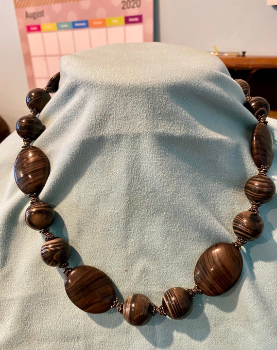 Heavy stone necklace deals
