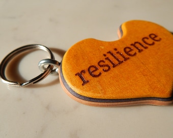 Resilience Heart Keychain made from a Recycled Skateboard