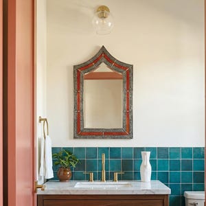 Orange Shield Mirror: Asymmetrical Vanity Decor