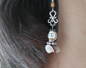 Skully dangle earrings, metal, bone, wood and shell