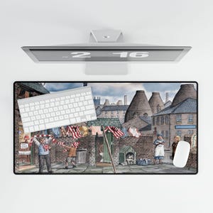 May include: A colorful illustration of a street scene with brick buildings, a clothesline with laundry hanging, and people walking by. The scene is set in a town with a row of kilns in the background. The illustration is in a vintage style.