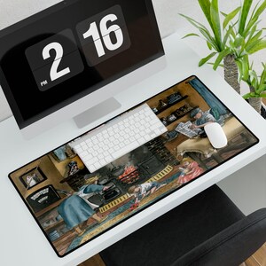 May include: A rectangular mouse pad featuring a detailed illustration of a vintage kitchen scene with a fireplace, a woman cooking, and a man reading a newspaper. The pad is on a white desk with a computer, keyboard, and mouse.