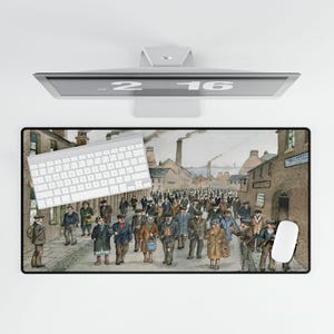 May include: A rectangular mouse pad featuring a vintage watercolor painting of a crowd of people walking down a street lined with brick buildings and factories. A white keyboard and mouse are on the pad.