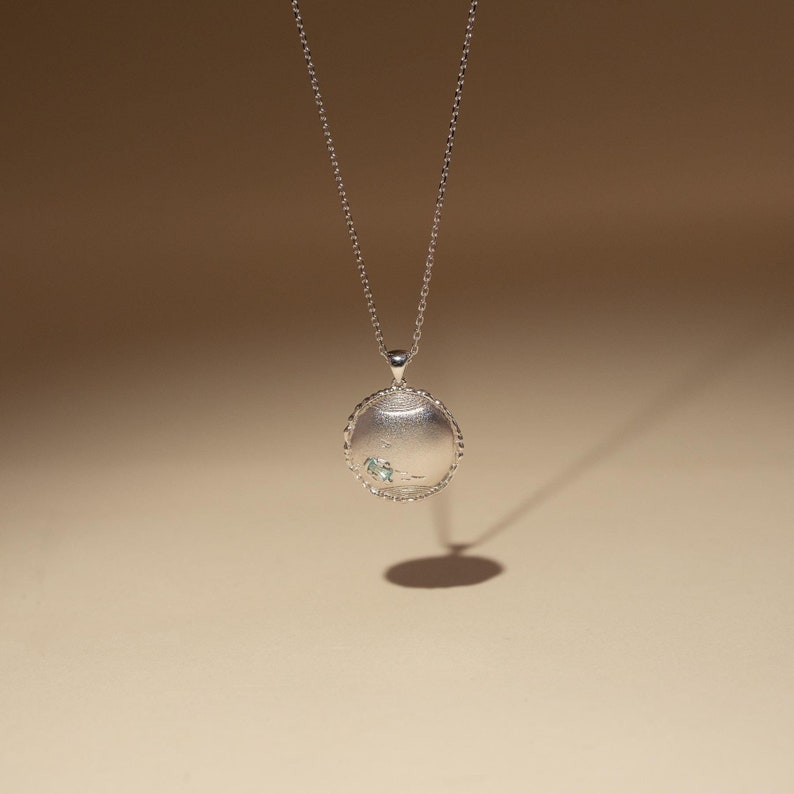 Planet Neptune silver necklace with aquamarine.