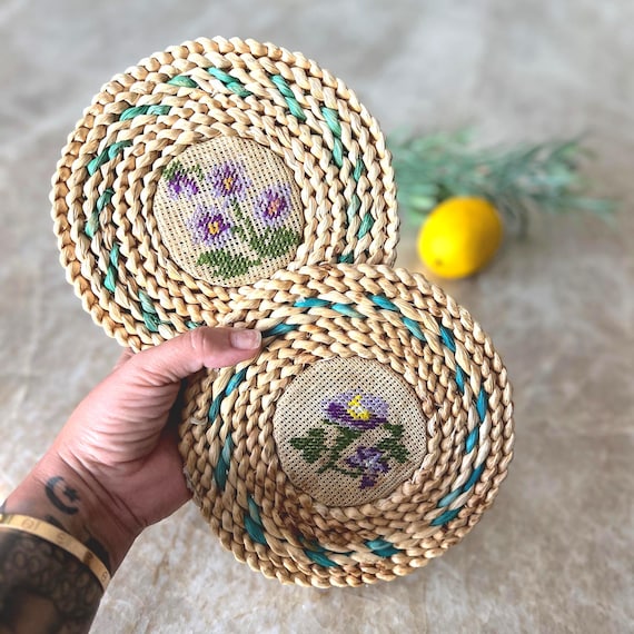 Set of 2 Vintage Rattan Trivets with Embroidered Floral Centers – Boho Cottagecore Kitchen Decor, Handwoven Straw Hot Pads, 7" Round