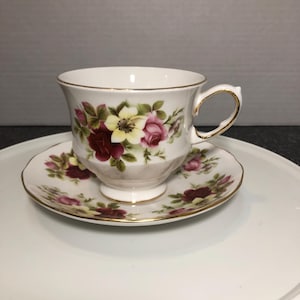 Vintage Queen Anne bone China teacup and saucer floral roses cup