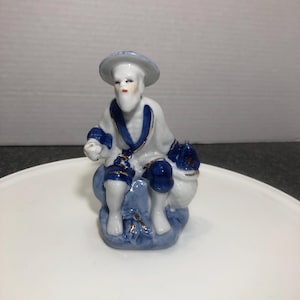 Vintage porcelain Chinese Asian fisherman cobalt blue and white figurine statue hand painted gold decor collectible