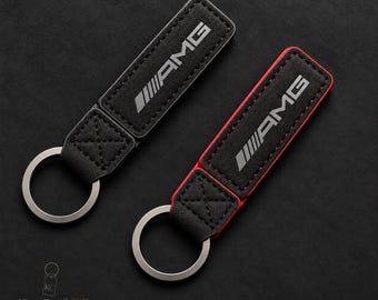 Mercedes AMG key fob with AMG logo / Alcantara leather / Black and red stitching