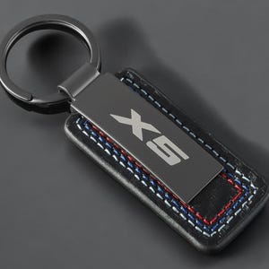 Bmw X5 Schlüsselanhänger in schwarz mit BMW X5 Schriftzug
