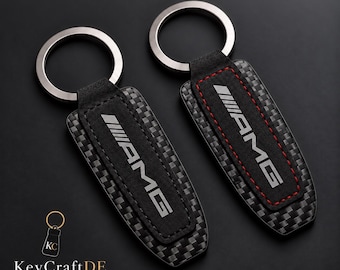 Mercedes AMG key fob with AMG logo in carbon look / black with red stitching