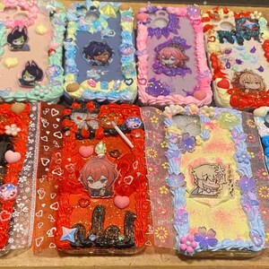 May include: Ten colorful phone cases decorated with a variety of cartoon characters, hearts, and swirls. The cases are made of a clear plastic material and have a 3D effect.