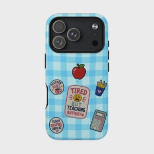 May include: A light blue and white gingham patterned phone case with various teacher-themed patches. Patches include a red apple, pencils, a calculator, and text that reads "Teacher Fuel", "Tired but Teaching Anyway", and "Teach Inspire Repeat".