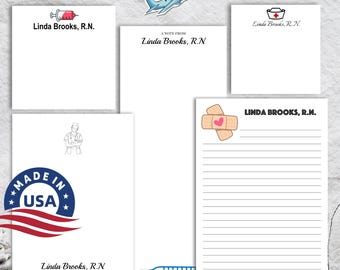 May include: Set of five blank note cards with different medical-themed illustrations. The cards feature a syringe, a nurse's cap, a bandage with a heart, a thermometer, and a nurse in a medical gown. The cards are all white with black text that reads "Linda Brooks, R.N." and "LINDA@GMAIL.COM 317-255-2419". The cards are made in the USA.