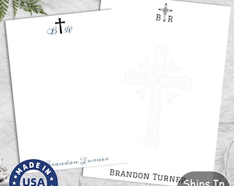 May include: White notepad with a black cross and the initials "B.R." printed on the top. The notepad has a decorative cross design on the back and the text "BRANDON TURNER" printed at the bottom.