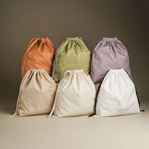 Exempellänk Anpassade logotyp Dammskyddspåsar: Kuvertstil med dragsko, personlig påse, reseförvaring