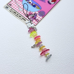 May include: A set of three ceramic mugs with a speckled, matte finish. The mugs are in shades of cream, light gray, and dark gray. Each mug has a simple, minimalist design, perfect for coffee or tea.