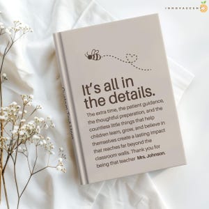 May include: A light beige rectangular book with a dark brown bee graphic and a dotted flight path. The text reads: It's all in the details. The extra time, the patient guidance, and the thoughtful preparation, that help children learn, grow, and believe.