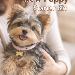 Puede incluir: Un cachorro pequeño y feliz con un collar rosa y una etiqueta en forma de hueso es sostenido en brazos. El cachorro tiene una mezcla de pelaje marrón, negro y canela. El texto "New Puppy Starter Kit" se muestra encima del cachorro.
