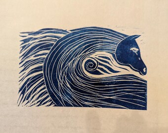 May include: A blue and white linocut print of a horse's head with its mane flowing in the wind.