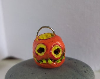 Creepy tiny pumpkin made of air dried clay Handpainted with acrylics; pendant, charm, or cute display pumpkin less than 20 dollars